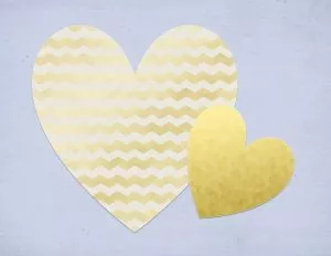 blue background with two gold hearts