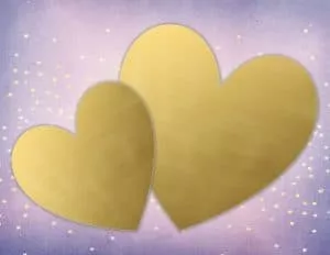 two gold hearts on a pretty background