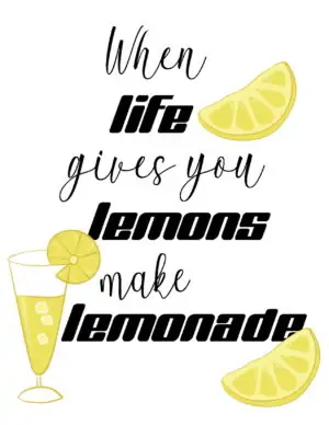 A glass of lemonade with three lemon slices
